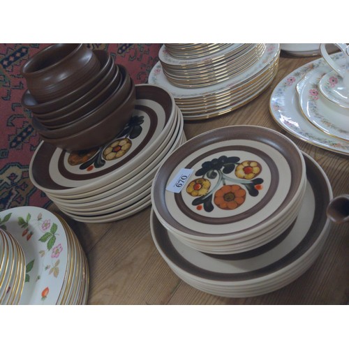 670 - Denby style brown small tea cups and coffee pot plus, plates, bowls etc..,