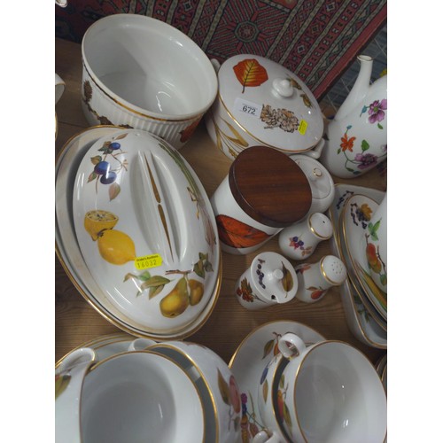 672 - Royal Worcester Wild Harvest and Evesham dinner ware, coffee pot, serving dishes etc., part of a ten... 