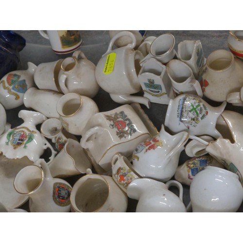 681 - Box of Arcadian China crested ware and a selection of commemorative beakers and mugs etc.