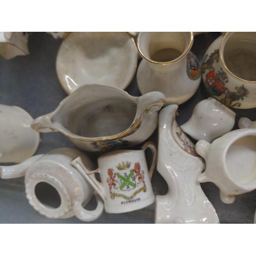 681 - Box of Arcadian China crested ware and a selection of commemorative beakers and mugs etc.