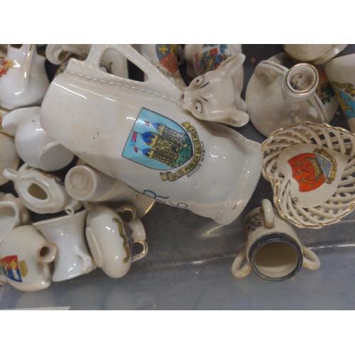 681 - Box of Arcadian China crested ware and a selection of commemorative beakers and mugs etc.