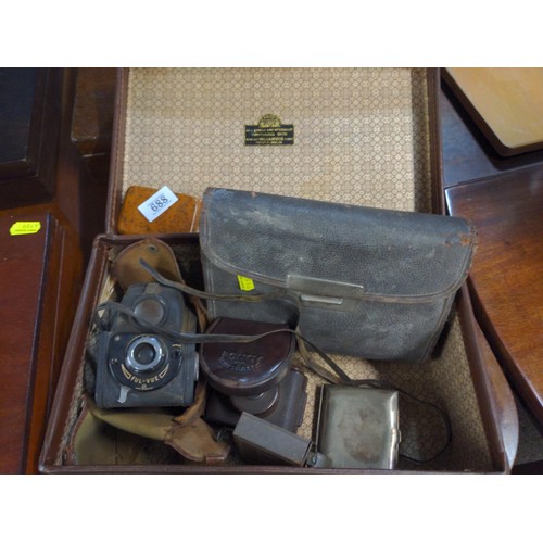 688 - Small brown case containing Various collectables Inc Bakelite V.P.Twin camera, Ensign Camera, Austra... 