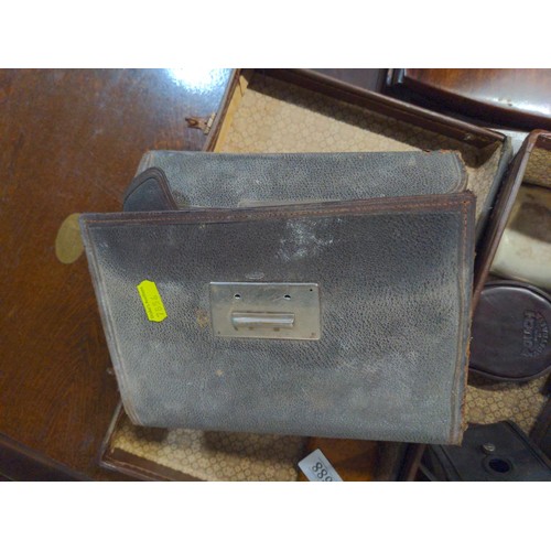 688 - Small brown case containing Various collectables Inc Bakelite V.P.Twin camera, Ensign Camera, Austra... 