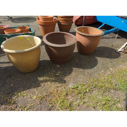 94 - 3 large plant pots. Tallest 32cm high