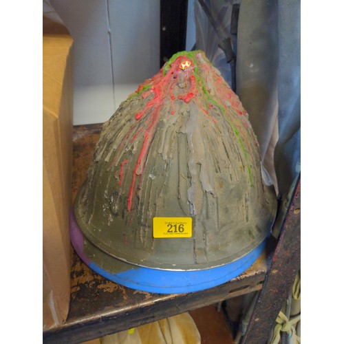 216 - 2 military helmets (decorated)