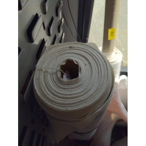 219 - 2 large rolls of material. 1 is 100% cotton