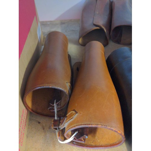 234 - 3 pairs of leather gaiters.