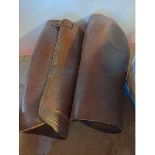 234 - 3 pairs of leather gaiters.