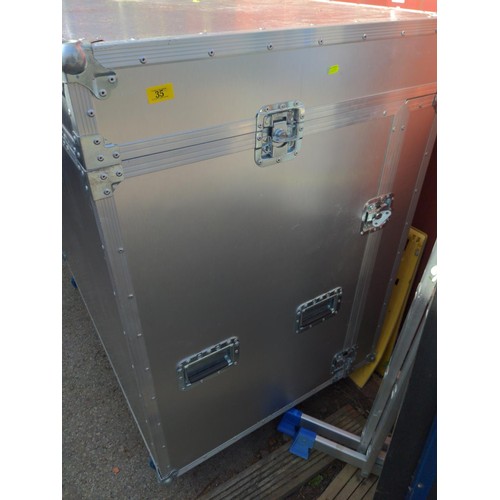 35 - Large wheeled flight case, fitted with small drawered desk inside. Overall W121cm D80cm H123cm