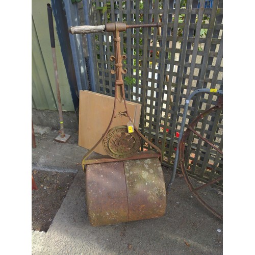 3 - Ornate cast garden roller by Follows & Bates, Manchester. W51cm. Wooden handle AF.