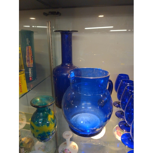 638 - Coloured glass, Medina vase 12 cm, two blue glass jug and vase H 31 cm