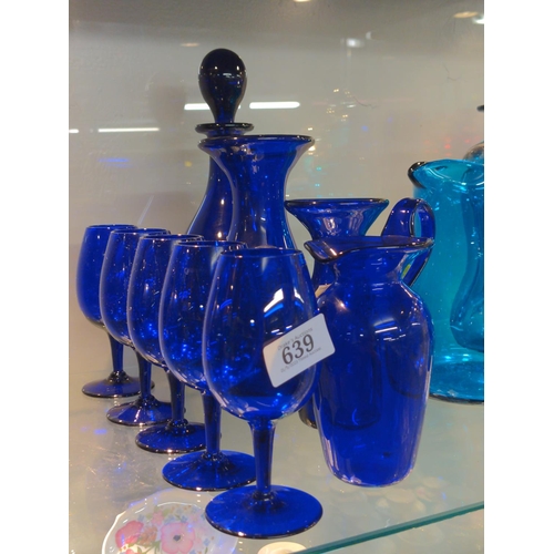 639 - Collection of deep blue glass consisting of 5 goblets, decanter, two vases and one jg marked Bristol... 