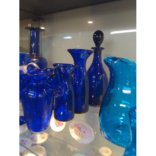 639 - Collection of deep blue glass consisting of 5 goblets, decanter, two vases and one jg marked Bristol... 