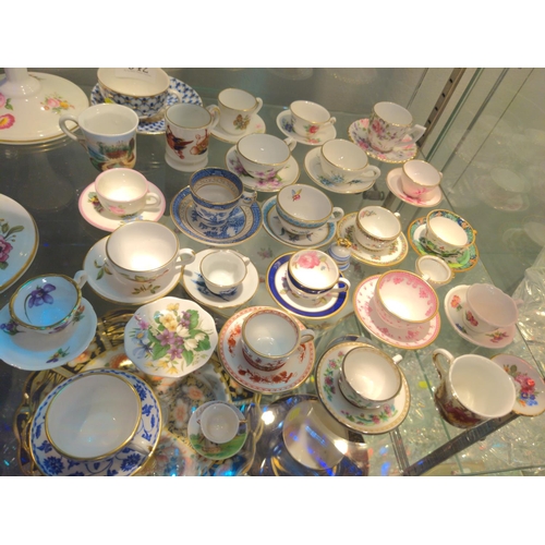 642 - Selection of miniature Spode, Coalport, Crown Staffordshire tea cups and saucers.