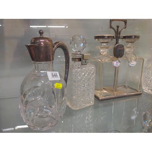 646 - Four cut glass decanters, one has a Silver lock, two are in a lockable tantalus, ( no key) Tallest d... 