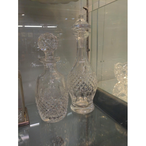 647 - Waterford Crystal bowl and two decanters, marks to base. Tallest decanter 33 cm