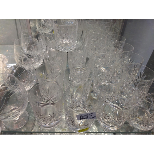 655 - Two shelves mixed glass, crystal etched and cut. Various styles and sizes plus one large etched glas... 