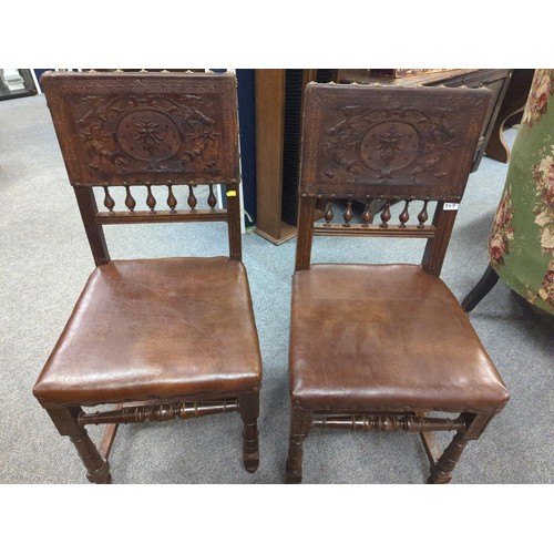 847 - Pair of worked leather dining chairs