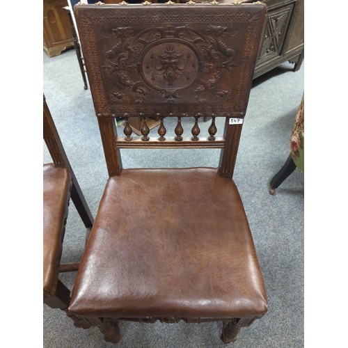 847 - Pair of worked leather dining chairs