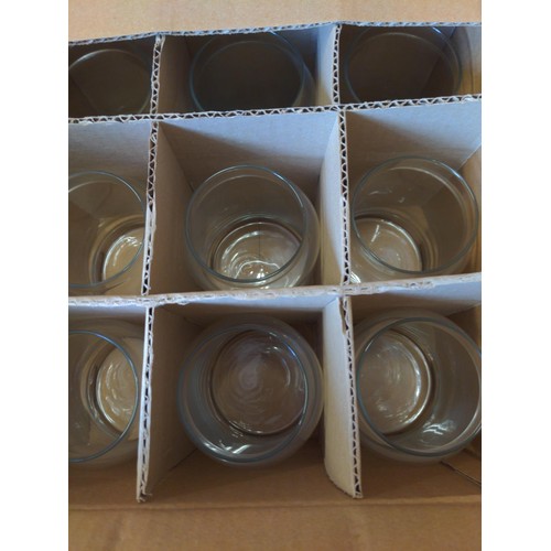 283 - 4 boxes of new Libbey 70997 glass storage jars with lids. Good for candle making.