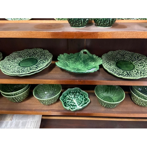 346 - Large selection of cabbage leaf design dining ware Inc, side plates, bowls, and others small dishes.