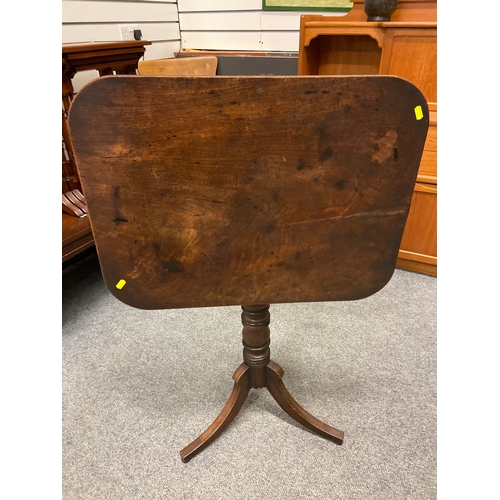 832 - Pedestal tilt top table in hardwood finish with turned centre column. W69D52H73cm