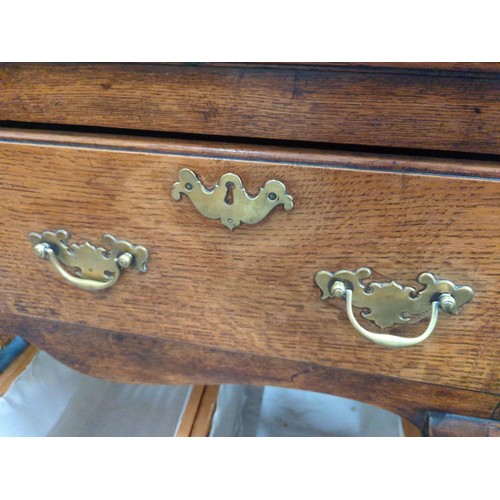 837 - Oak sideboard with two deep drawers with brass drop handles and escutcheons W120 x D46 x H83cm