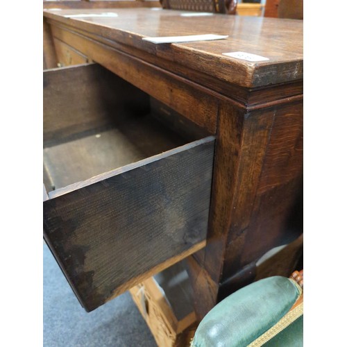 837 - Oak sideboard with two deep drawers with brass drop handles and escutcheons W120 x D46 x H83cm