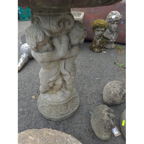 25 - Reconstituted putto based bird bath. H68cm. With repair.