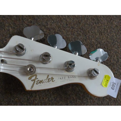 569 - Squire Fender Jazz Bass guitar made in China (s/n CGS0917090) along with a gear4music S158 amplifier... 