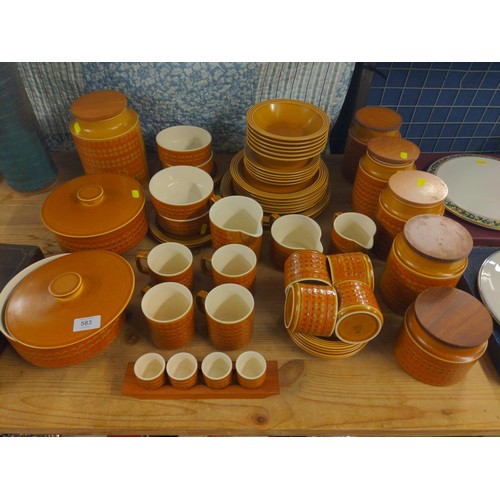 583 - Hornsea Saffron dinner and tea service including kitchen storage jars