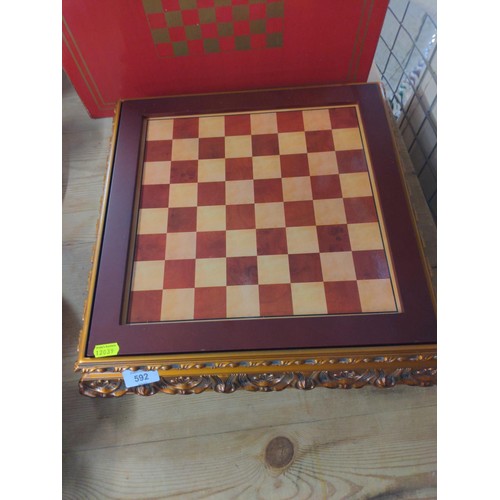 592 - Napoleonic themed chess set pieces stored in board