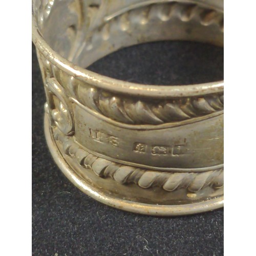 496 - Two hallmarked silver napkin rings