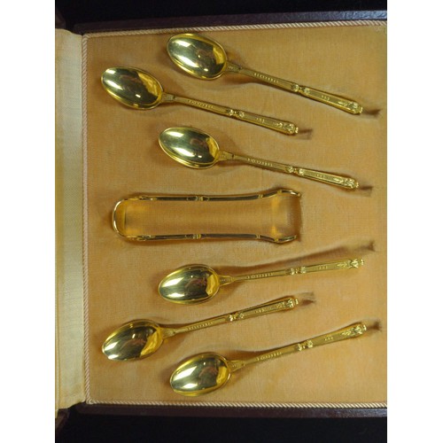 497 - Set of twelve 800 silver handled butter knives and a set of six gilt coffee spoons with sugar nips, ... 