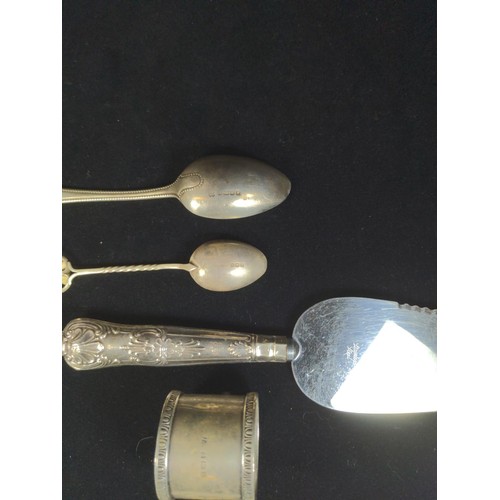 498 - Hallmarked silver, including: napkin ring, spoons, butter knife, silver handled cake slice and butte... 