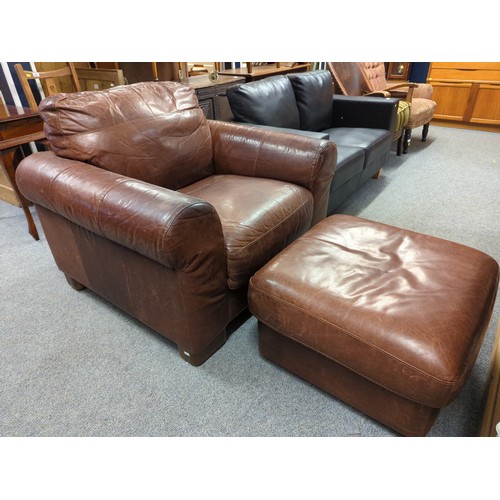 881 - 'Sofitalia' brown leather club chair with footstool