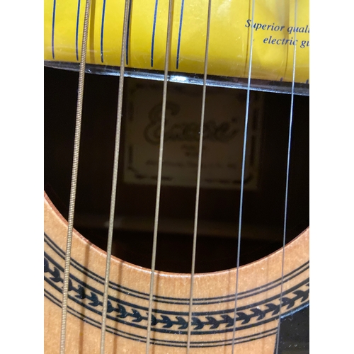 570A - Encore 6 string full size country style acoustic guitar model (W255) new strings plus another set of... 