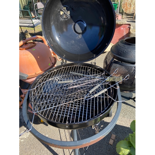 9A - Mobile BBQ with two wheels, large domed cooking area with smoking lid. Also has drip pan, griddles a... 