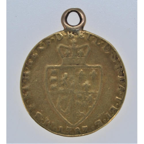 5 - George III 1787 gold spade guinea, with soldered pendant mount, diameter 24mm, 8.3 grams