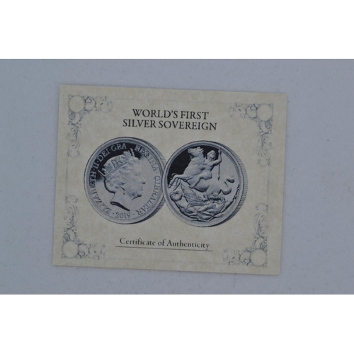 39 - Three silver coins, including: The Platinum Wedding Anniversary Solid Silver Proof £1 Coin; 20... 