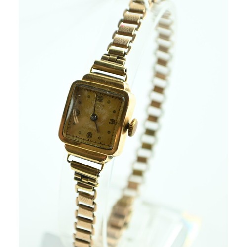 61 - Titus ladies watch 18ct case on a 9ct gold strap. weight minus movement 11 g