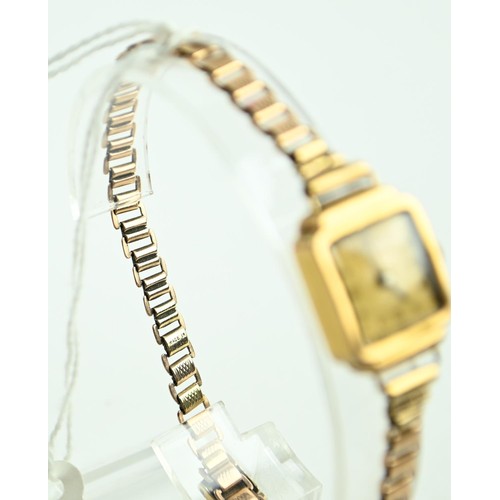 61 - Titus ladies watch 18ct case on a 9ct gold strap. weight minus movement 11 g