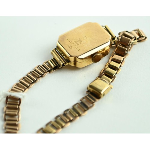 61 - Titus ladies watch 18ct case on a 9ct gold strap. weight minus movement 11 g