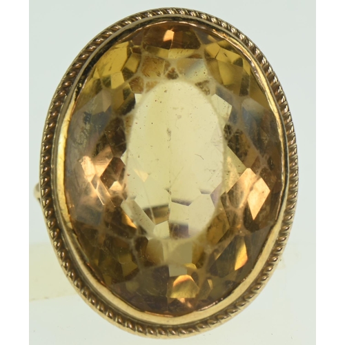 78 - 9ct gold ring set with large citrine measuring approx 29 x 27mm diameter, size K, gross weight 11.64... 