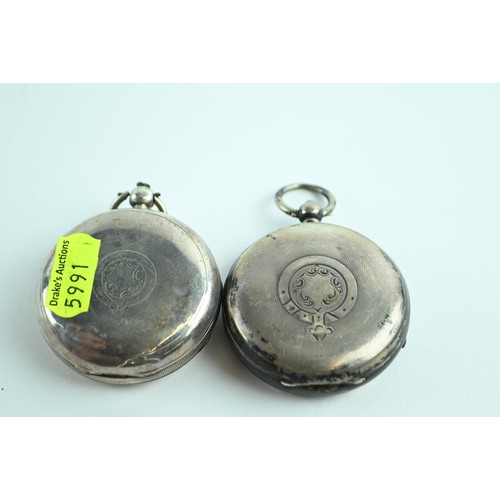 67 - Two gents silver pocket watches as found. Both opened face and one with T.P.H. 806 inside back and t... 