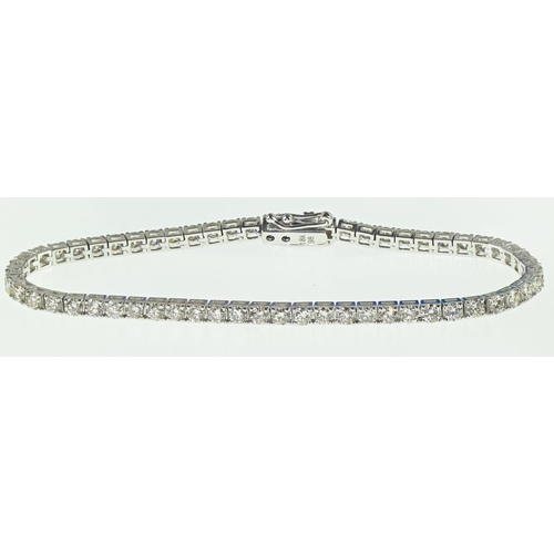 94 - 18ct white gold and diamond line bracelet, the diamonds together weighing approximately 4.85 carats,... 