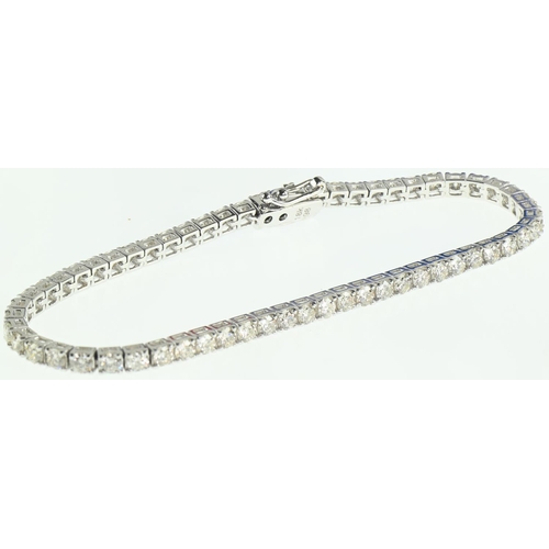 94 - 18ct white gold and diamond line bracelet, the diamonds together weighing approximately 4.85 carats,... 