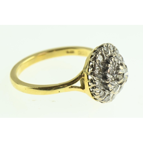 107 - 18ct gold and diamond cluster ring, size P1/2, gross weight 5 grams