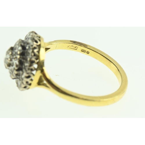 107 - 18ct gold and diamond cluster ring, size P1/2, gross weight 5 grams