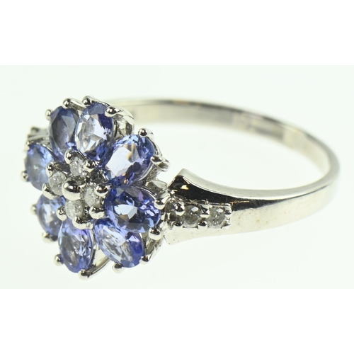 109 - 14ct white gold, tanzanite and diamond ring, size O, gross weight 3.69 grams